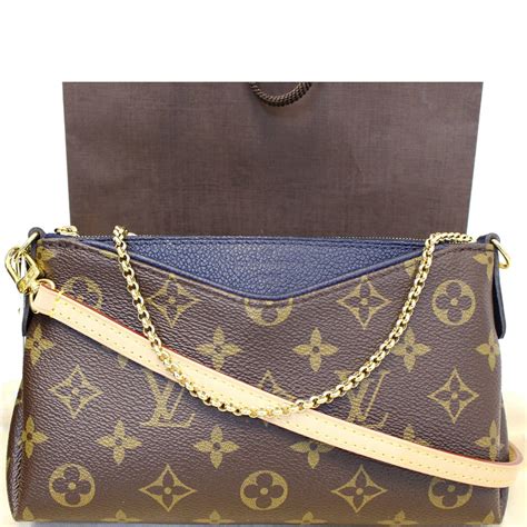 louis vuitton clutch bag monogram|More.